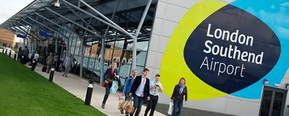 Passengers leave London Southend Airport terminal r